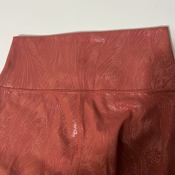 Lululemon leggings. Pink with a subtle pattern, size 4, great condition. - Picture 4 of 7